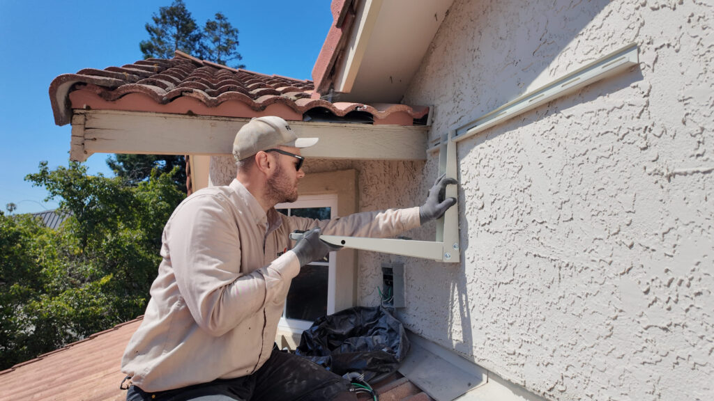 Professional servicing AC in spring which is the best time to buy an air conditioner
